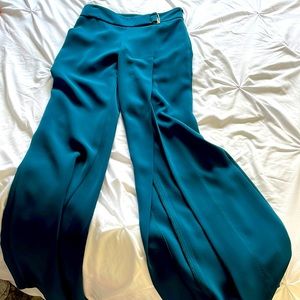 COPY - Open slit BEBE bell bottoms pants.